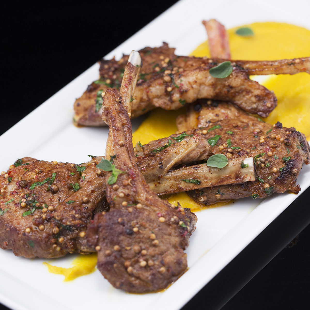 Greek-style lamb cutlets with braised white beans