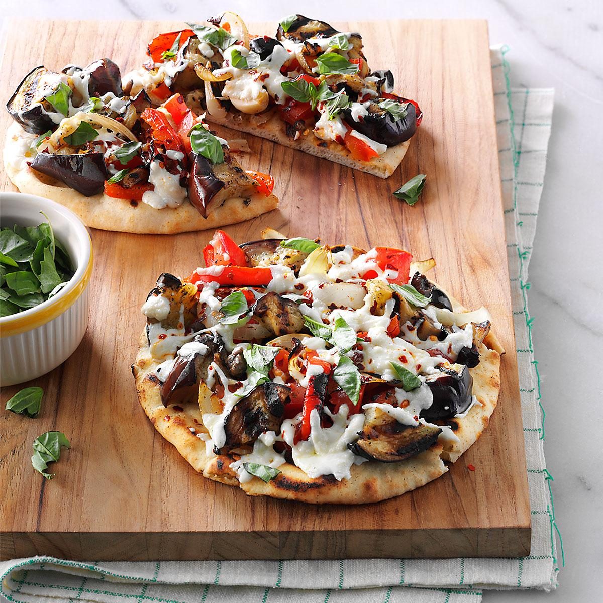 Indian-style lamb and eggplant pizzas